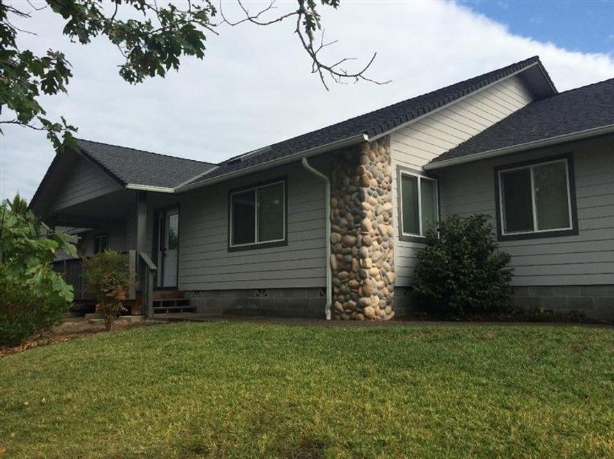 Exceptional Forest Hills Subdivision! Priced for immediate sale! This custom 3 bedroom, 2 bath home with split bedroom floor plan is move in ready today. From the beautiful kitchen, with hardwood floors that stretch into the dining area, to the large open living space with vaulted ceilings, you will find the single level home making you feel right at home. The master bedroom is HUGE, with WIC and separate shower and jetted tub. The other bedrooms are a comfortable size. Additional features include: central vac, large laundry/mud room, pantry, front deck and covered rear patio. The finished 3-car garage has plenty of parking or space for a workshop. Exceptionally priced, exceptional location, don't wait.