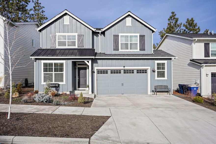 Welcome to Starview in SW Redmond! This modern farmhouse by Stone Bridge Homes is situated on a desirable corner lot, combines thoughtful design with modern finishes throughout. The open-concept main level features a bright living area with a versatile front bedroom or den, perfect for guests or a home office. The functional kitchen boasts a central island, ample counter space, generous storage, and a large corner pantry-ideal for entertaining and everyday living. Step out from the dining area on to the covered deck overlooking a fenced and landscaped backyard. Upstairs, you'll find two bedrooms, a full bathroom, a spacious bonus room, and a convenient utility room. The luxurious primary suite offers dual vanities, two walk-in closets, and a tiled shower, creating a private retreat. This home perfectly balances modern elegance with functional living in one of Redmond's newest neighborhoods.