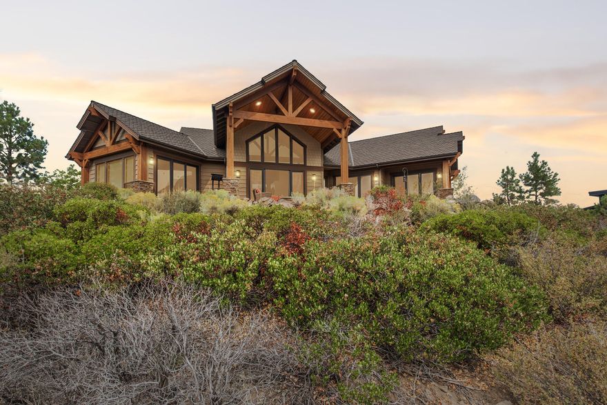This exceptionally designed single level home sits atop a bluff in the heart of Tetherow. With craftsman detailing throughout including the wood lined vaulted ceiling and open beams upon entry.The home was designed to take in some of the finest golf course and expansive Cascade mountain views in Tetherow and is filled with natural light. Rooms include 3 master suites, dedicated office with patio, vaulted great room, open chefs kitchen and eating areas. Large pantry and special cabinetry throughout. Generous 3 car attached garage. Home is equipped with solar for energy efficiency. CLA regarding Tetherow membership details.