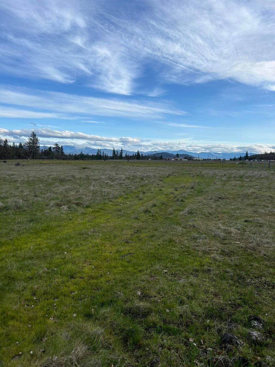 PROPERTIES LIKE THIS ARE HARD TO FIND! This highly sought after 10.11 acres in Eagle Point has unlimited potential!  Country living with deer and elk- not too far from fishing.  All this with the convenience of shopping just 12 minutes away from home.  Home placement has endless possibilities to take advantage of the mountain views or the private grounds.  Perfect hideaway to enjoy the peaceful setting or it can be the perfect spot if you love to ranch.  Buyer to do their own due diligence.