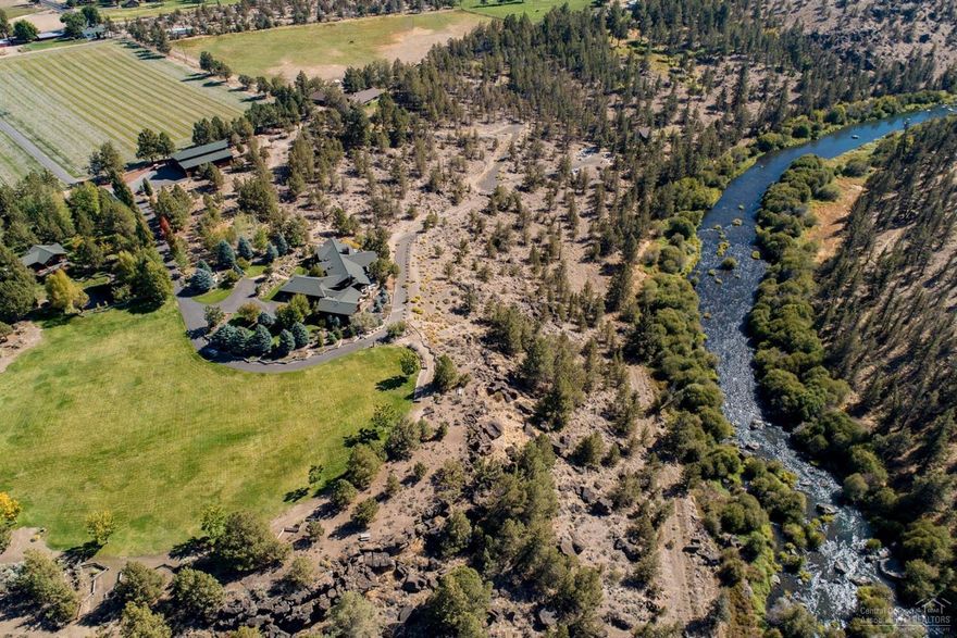 Rare opportunity on the Deschutes River w incredible Cascade Mountain views! Gated & private 34.04 acres on 2 separate tax lots w 23.6 acres of irrigation. Exceptional NW timber style single level main home features beautiful wood accents & attention to detail throughout. Charming kitchen w island & breakfast bar, open concept great room w gas/wood burning stone fireplace, large master suite, copper soaking tub, walk in shower, separate water closet, vaulted ceilings & expansive windows showcasing the panoramic views, multiple outdoor living spaces & hot tub overlooking the river. Attached 2 bed/2 bath guest quarters allow overnight guests ample privacy & space to spread out. Separate 1 bed/1 bath studio, lap pool, perfect for enjoying the warm summer sun! Property also includes Adair built 3 bed/1.5 bath caretaker's quarters, shed row barn w 2, 4 stalls, office/tack room, expansive main barn, shop, horse facilities, arena, storage building. Excellent access to the Deschutes River!