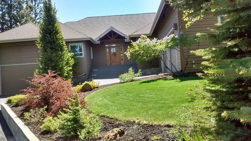 This spacious custom home is on the 14th tee of Rivers Edge golf Community. Features vaulted ceiling great room with thermostat controlled fireplace. Granite island and quality appliances in kitchen. Formal dining room off the kitchen and great room. Living space is all on one level. Master suite includes master bath and two closets including a walk-in with custom organizers. Large office/bedroom, guest bedroom and bath. All living spaces have golf course view of 14th fairway. Great outdoor living space on a huge Trex deck. Finished heated bonus room above the 2-car garage. This home also features a 42 foot RV garage that is climate controlled with all hook-ups. There is a basement storage area under the great room accessed via the RV garage. Other amenities in this quality home include gas stove top and patio BBQ, double ovens, dual hot water heaters and recirculation pump, home security system, and backyard water feature creating the soothing sounds of a mountain stream.