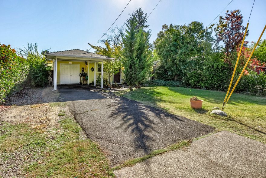 This amazing home feels much larger than stated square footage and is definitely a must see. The owner has put lots of work into the home making it absolutely amazing with a fresh and custom feel. She has just installed a brand new split system heating and air conditioner that works fabulous. The carport has a room behind it that could be remodeled and used for a craft shed, storage And or maybe an extra office or something else creative. The backyard is huge with a covered patio. The area actually feels like a quaint neighborhood.