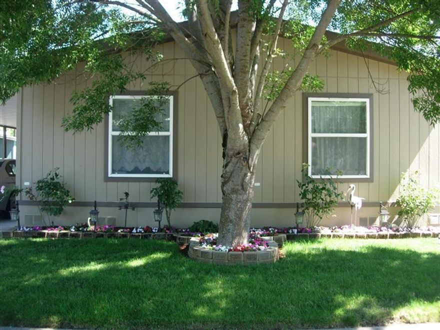 Show this one to your clients and they will fall in love! Beautifully maintained manufactured home in park (all ages and pets welcome) Awesome floor plan, split floor plan with seperate living & family rooms. Updated and functional country kitchen includes all appliances. Seperate laundry room. Lots of storage. The master is spacious with a huge walk in closet. Seller just put on a new bi-level deck that is great for entertaining! Pride of ownership right here!