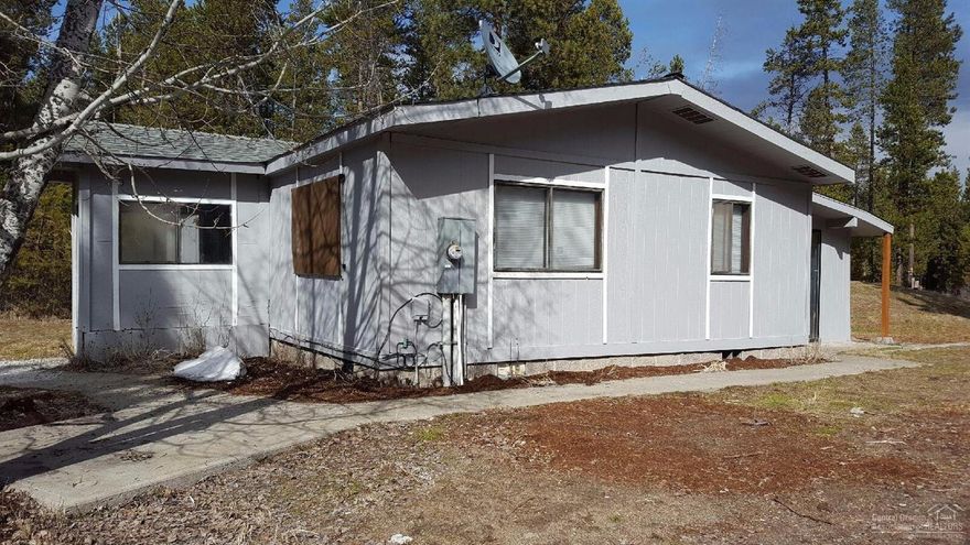 Fully fenced and gated this home is just off the beaten path with a ton of privacy and yet close to main roads. Located close to the river, watch the elk and deer roam the neighborhood while enjoying peace and quite. 2 outbuildings for storage, RV pad on back of property. Newer paint and roof. Great possibilities for this property. Close to Little Deschutes River.