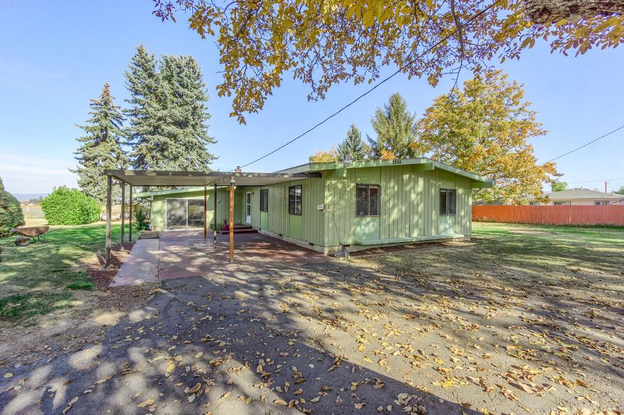 Rare acreage of 2.81 acres, all flat with 2 legal parcels, 1.34 ac and 1.47 ac respectively.  Stick built 3 bedroom home with an updated full bath, beautiful hardwood flooring, plenty of sunlight, wood burning fireplace, wood kitchen cabinetry. One bedroom has a jack and jill style half bathroom, considered the master suite. There's a detached bonus room too! Stunning views of both Table Rocks, but Lower Table Rock is breathtaking from your back patio with over an acre and a half of land for a barn, pool, storage, second dwelling or a farm! This lovely home is set way back off Stewart, with enough space in front for a gigantic detached garage/ shop or even a second home (Buyer to do due diligence). Unlimited potential with so much land in the COUNTY for extra low taxes and zero water bills because you're on a well. Make sure you see this diamond in the rough, in financeable condition today!