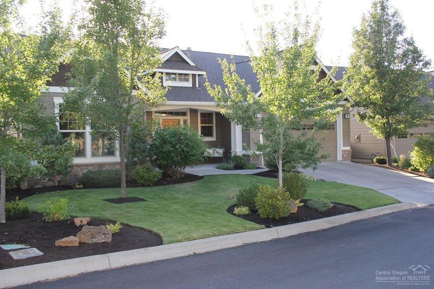 Located in one of Bend's most desirable neighborhoods, this River Rim property is loaded with charm and style. Over $20,000 spent on improvements in last 2 years: -Beautifully landscaped (front and back yards). Micro irrigation to every plant, all on timers. -New exterior paint, including all fences. All trim sealed. -New hardwood floors. -New roof!! Guys, no worries for decades. Gals, you'll love the charm and style of this home and the great neighborhood.
