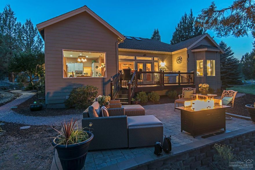 Ready to simplify? This single level home is surrounded by sweeping golf course views and offers Smith Rock sunsets. Only one immediate neighbor makes this a very private setting in Eagle Crest's 55+ community. New 2018 paver patio and a rare side yard brings your living space right outdoors. New Neil Kelley kitchen remodel with slate appliances, Caesarstone counters and tile backsplash.