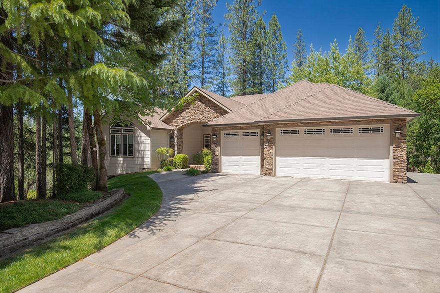 Nestled On 2.2 acres.  This stunning 4 bed,3 1/2 bath offers beautiful tree top views from all the large window and deck.  As You enter this Gracious  home you'll find an open,  spacious, yet cozy 3,108 square feet of living space.  The kitchen has granite counter tops, is a open concept with breakfast nook & bar, plus a large dining area.  This beautiful home has many special features including, a library,  a media room with projector, sound system and new carpet through out home,  vaulted ceilings,  walk-in closets, a generator and more.  Outside there is RV parking, Drip system on timers,  pasture area with a natural spring and a 2nd well from original home. This Lovely Home has a private setting in the country yet only 10 miles to local hospital, grocery stores, restaurants. Per County Planning, there is a good possibility property qualifies for a ADU.  through the JO CO app process.