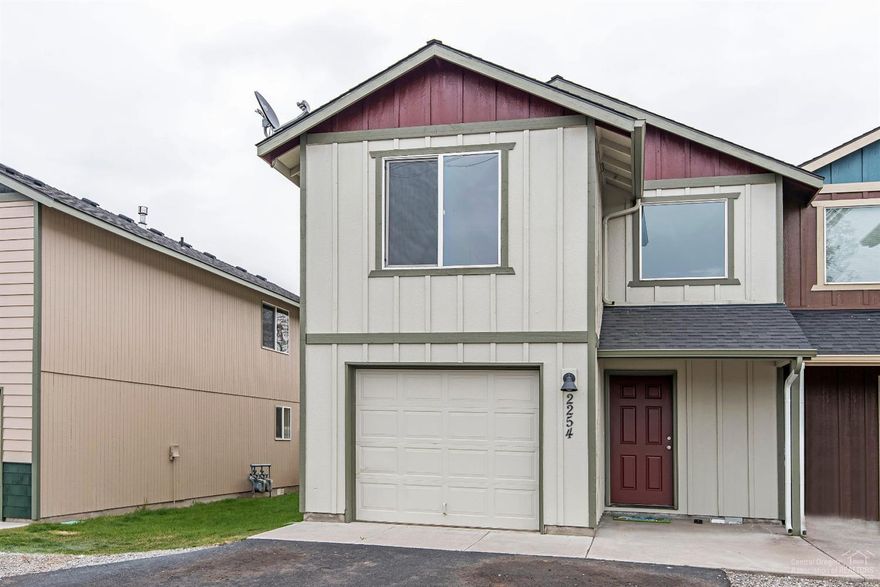 Available Now! Another Coho Crossing Townhome! Completely updated w/new paint inside & out. Laminate floors on the main level. Great room has stacked stone gas fireplace/sliding doors to vinyl fenced backyard/patio. Quartz countertops w/stone & glass backsplash. Great kitchen-new stainless appliances, breakfast bar & more. 1/2 bath & under stairs storage on main level. Carpeted upstairs w/nice separation of bedrooms & utility room to make laundry easier. Single attached garage. Easy access north or south