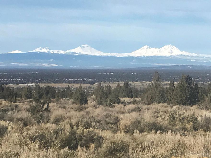 Panoramic Cascade Mountain views from this 4.97 acre parcel in Powell Butte. Beautiful building site, gentle sloping terrain. Shared well agreement in place. Avion water also available with hook-up fee. Power close by; neighboring power lines are all underground!