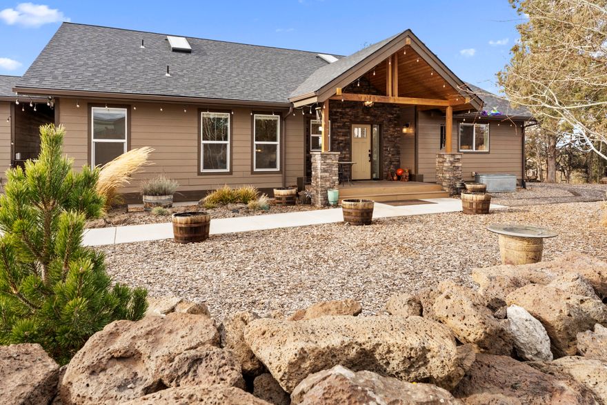 This wonderfully remodeled home embraces everything the Central Oregon Lifestyle embodies. Situated just above the Deschutes River with gorgeous views of the Cascade Mountains, this 4.73 acre property is ready for anything you can dream of. Completely fenced and cross fenced for your livestock, chicken coop, irrigated pasture, 24x25 covered RV storage with hookups, garden area and beautiful landscaping, sand arena, trail course pattern, two stall barn with heated tack room, concrete floor, power, water, large storage room/office space, hay storage, covered equipment storage. Property backs to BLM with riding trails leading directly to the river! Home is a 3 bed/2.5bath with over 3300 sq/ft with a fantastic open floorplan, mud room, office, fully finished basement, 20 kw solar power, updated irrigation equipment, sprinklers and drip system this property is ready to go! Did I mention the adorable cabin that has internet, heat, A/C and power??? Well there is one of those too!