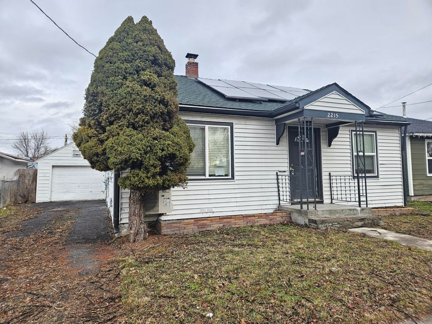This nice 2 bedroom 1 bath home is located in Mills Addition. Solar panels have been installed within the last few years along with other updates to the kitchen and bathroom. It has a detached 1 car garage with separate storage room. Fenced backyard that offers additional parking.