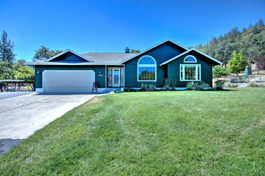 Imagine coming home to your own secluded 9.27 acre Oregon Dream Property. This Immaculate home & shop are located off the road down a gated & paved drive- The open floor plan with soaring knotty pine tongue & groove ceilings are complimented w/ several windows giving you an abundance of natural lighting. There are solid surface counters throughout the home w/tiled bathrooms, carpeted bedrooms & beautiful hardwood flooring. The kitchen peninsula is huge and perfect for entertaining. The master bedroom includes; beautiful tray ceilings, walk-in closet w/organizers, & sliding doors leading you to a gorgeous deck. Master bath has a super spacious double sink vanity & walk-in shower. Step outside to the SHOP w/built-in shelving, attic storage, & pellet stove! The property includes; 3 Timber Tek decks- perfect for wildlife viewing, an ornamental pond, lawn areas w/ in-ground sprinklers, garden area w/ garden shed, RV parking, tons of extra parking for all your toys! Must see!