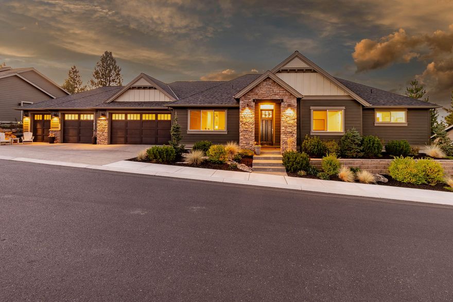 Stunning single level home overlooking the 10th fairway of the River's Edge Golf Course features expansive windows across the back of the house that look upon elevated golf course, vista & distant mountain views.  Located on a beautiful, quiet, and private street, this home boasts one of the best locations in the River's Edge neighborhood.  This impeccably built, single level, 3 bed, 3 bath 2775 sf Pahlisch home completed in 2018 is beautifully appointed throughout and has bright natural lighting.  The open floor concept great room has soaring soffit ceilings, a dramatic stone fireplace, and a gourmet kitchen for entertaining.  Featuring a beautiful dining area w/ upgraded built-ins, spa-like Primary Suite with soaking tub, private guest suite with den/media room, wet bar, custom cabinets and additional access to the garage.  Huge laundry and craft room.  Highly desirable south facing home, 3 car finished garage plus an additional golf cart bay adds to this immaculate dream home.