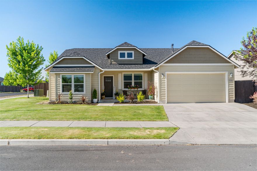 In Redmond's desirable Megan Park neighborhood, this award-winning Snowbrush plan offers 2,046 sq ft of single-level living with brand-new LVP flooring and fresh landscaping. The open kitchen features a large island, ample counter space, and generous storage, flowing into a spacious great room with gas fireplace and dining area. The private primary suite includes dual vanities, a soaking tub, separate shower, and a huge walk-in closet. Three additional bedrooms, one ideal as an office, share a second bathroom with dual sinks. The fully fenced backyard includes a hot tub, and the oversized 2-car garage has a 4-ft extension and 8-ft tall door.
Enjoy A/C for summer comfort. 

Less than a mile to the Dry Canyon Trail system and 2 miles to Downtown Redmond, where you'll find great restaurants, food trucks, live music, and small-town charm. Redmond is the Hub of Central Oregon with easy access to Mt. Bachelor, Hoodoo, Sisters, and Bend. 18 miles to Bend, 4 miles to Redmond Airport.