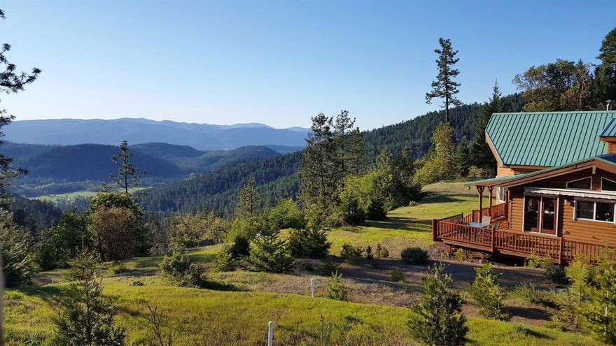 Hope Mountain Sanctuary: View Home, 2 year-round Creeks, many Business Opportunities, Substantial Timber Value on 231+ private acres. Nature Lover's Paradise! Enjoy your Privacy, Wellness and Independence. Million Dollar Views on 2 tax lots in a high-end, modern, eco-friendly Chalet style home with National Forest on 4 sides just 15 min. to Cave Junction. Owner Will Carry with min $650k down. Stunning home completed in 2012, 4 bed, 4 bath, 2544 SqFt on 2 levels, extensive decking with views. Open floor plan, Granite Counters, Vaulted Ceilings, Hardwood Floors. FC zoning allows many business uses. Great hydropower potential. Included are 430 acres of our own PRISTINE, forested mining claims contiguous to the property. Off the grid, self-sufficient solar electric power. Property has an Exempt Spring which means it's your water to use and store. Many trails right from your front door! Adventure & Tranquility Awaits! HughesNet, SEE VIDEO - https://youtu.be/rMMJaQSKm-8