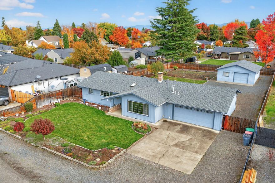 Single Story Charmer on a HUGE lot .34 acre! Rare dual-garage setup-a 593 sqft attached garage plus a spacious 768 sq ft detached garage set back from the home, offering the perfect footprint for a potential ADU, workshop, or studio. This delightful 3 bedroom 2 bath home is very low maintenance so you can spend your time enjoying your green thumb in your beautiful backyard or precious time with your family and friends. Just minutes to Costco and the freeway make this home one you will want to come see and fall in love with!