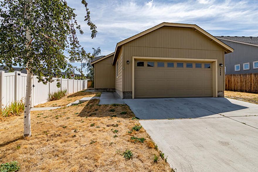 This great little house has tons of potential, with 2 bedrooms, a primary suite with bathroom and walk-in closet, and a second bedroom also with a walk-in closet.  The living room has vaulted ceilings.  There is a 2 car garage with opener and room for additional parking off of the driveway.  There is a nice space for a good sized yard, or garden, or to landscape as you wish.