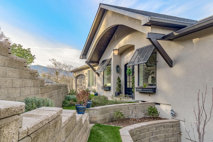 Welcome Home! Completed in 2018, this Clason custom build, offers 180 degree views of Ashland's mountains and valley from virtually every room! No detail spared including 10+' ceilings, 8' solid wood doors, custom cabinetry, Visual Comfort lighting, walk-in closets and crown molding throughout. Chef's kitchen includes a large island, KitchenAid appliances, double ovens, Wolf cooktop, walk-in pantry, and separate bar with wine fridge, storage and ice maker. Open concept Greatroom offers versatile floor plan for relaxed living and dining, vaulted ceiling, stone surround gas fireplace, hardwoods and indoor/outdoor flex-room with gas fireplace & heater. Coupled with the expansive patio and Sonos sound system, this home is an entertainer's dream. Downstairs includes family room and four view-worthy bedrooms including expansive Master suite with spa-like bath; separate shower, soaking tub, dual sinks, and laundry room. Abundant storage throughout, as well as room for addition!