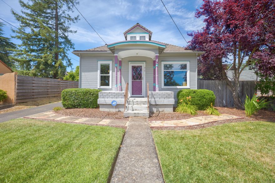This 1910 home has many upgrades! Located near Lawnridge Park, and in the middle of beautiful NW Grants Pass. This 2 bedroom and 1 bath home has a well thought out back yard, and what was the garage is now used for extra guest space. Updates include, ceiling fans, new HVAC in 2015, insulation added under home and attic, ramp in back yard, custom blinds, front windows upgraded in 2022, and front yard landscaped in 2024. Granite counters in the kitchen, and hand bars installed in the bathroom. Well maintained home that has the charm of an older home with updates to comfort.