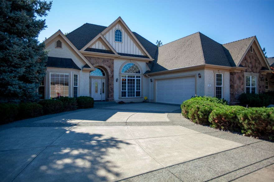 A Golfers Dream! You know how hard it is to find a home on the golf course. Welcome to 100 Pebble Creek, a beautifully designed home on the Eagle Point Golf Course. Soaring ceilings, custom woodwork, and expansive windows fill the home with natural light and capture golf course and mountain views. The spacious primary suite features a tray ceiling, bay windows, and a spa-like bath with dual vanities, soaking tub, and walk-in shower. The kitchen has granite counters, abundant cabinetry, and a breakfast nook surrounded by windows. Multiple living areas include a cozy fireplace, formal and casual spaces, plus a home office. Step outside to the patio perfect for entertaining or relaxing as golfers pass by. Located minutes from shopping, dining, and schools, with easy access to Medford, Crater Lake, Rogue River recreation, and local wineries. Southern Oregon living at its best!