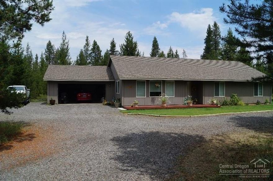 Maintained to a T! This home has been lovingly cared for & it shows. Manicured lawns front & back on sprinkler system, attached double garage plus 480 sq ft detached shop that has all the bells & whistles. Circle gravel driveway with extra parking on the side of the home. Roomy 4 bedroom home with plenty of storage & nice floor plan. A joy to show, with good flooring & paint! Call to see today. Huge price reduction, sellers are motivated.