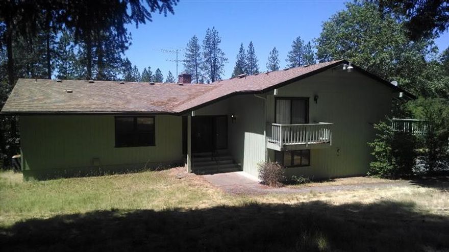 Bring the family to this spacious home! Located in a semi-private are, yet still close to town & conveniences. This home has character, charm & lots of room for entertaining. Home sold as-is.