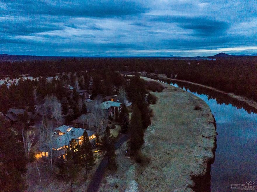 Seize the opportunity!! Rarely listed Skypark home right on the river. NW Contemporary, artfully perched w/west facing decks overlooking the Deschutes & Mt Bachelor. River views from almost every room. Dramatic foyer leads to vaulted great room on main floor; tons of natural light, floor to ceiling windows & spacious layout-an entertainer's dream! Kayaking, rafting & tubing right out the back door. 2 master suites & 3rd BR downstairs. Radiant hydraulic heating, A/C, Nest thermostats & sound throughout.