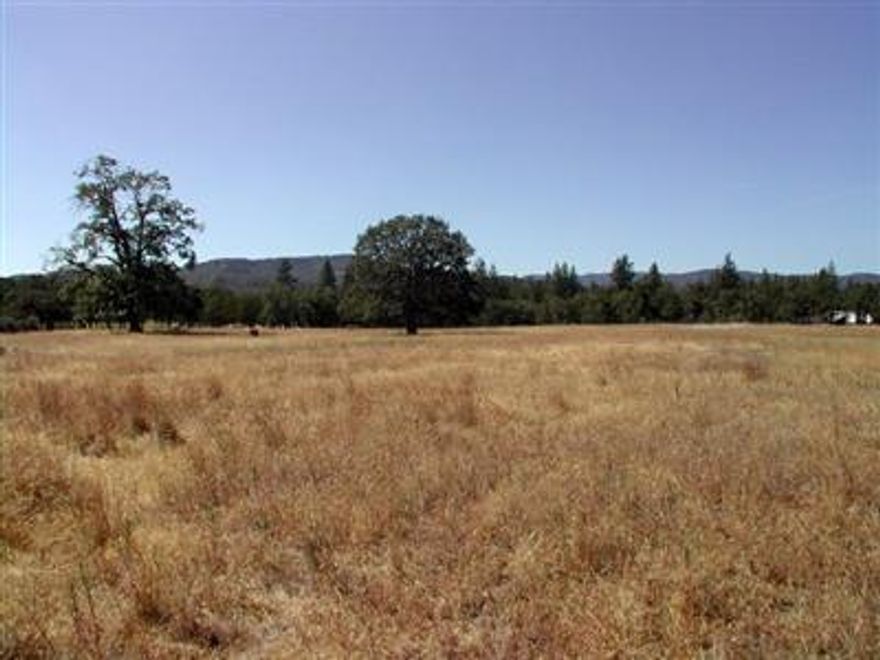 This is a beautiful piece of level land. Per Seller, there is electricity at the street. Buyer to verify. Looks like the gas line also runs along Hwy 62 at front of property. 8 acres mostly cleared and ready to go. Close in and private yet not secluded for those that like some privacy but not way out and with no neighbors. There is the adjoining parcel that is for sale also. Buy both parcels, 16 acres, for $339,800. We are putting together a home/lot package with DeCarlow Homes as the builder. Call for more information