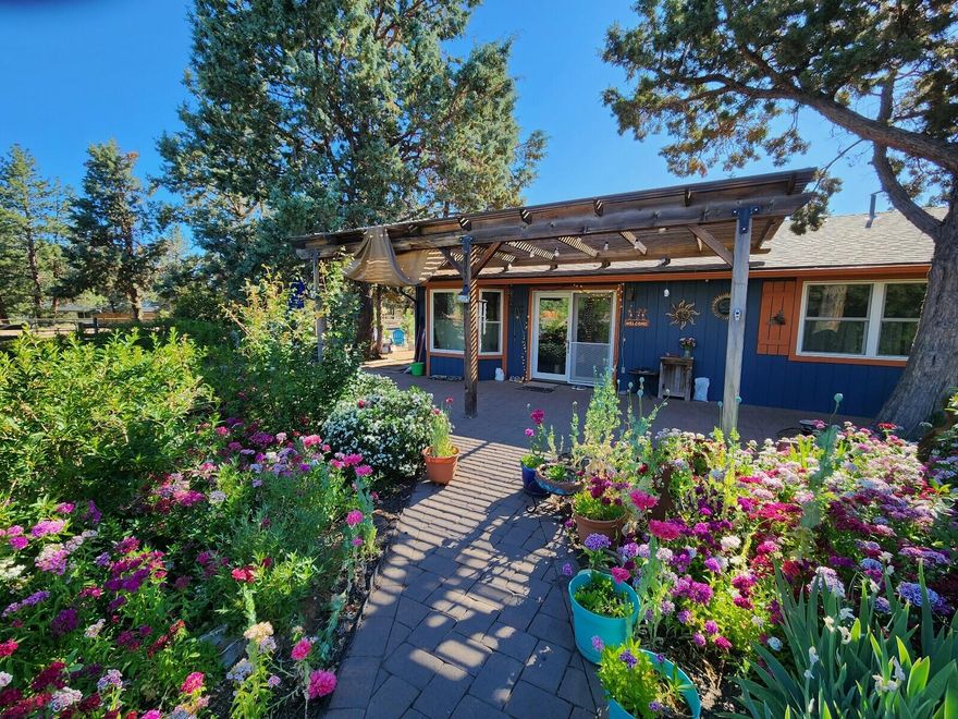 Welcome to your own slice of country charm on 2.28 beautifully fenced acres within the  Sisters Oregon School District. This inviting 3-bedroom, 2-bath home offers a perfect blend of comfort and functionality, featuring thoughtful upgrades throughout. Outside, you'll find a spacious barn, ideal for animals or your next hobby project, along with ample room to roam, garden, or simply enjoy the tranquil surroundings. Whether you're dreaming of a mini-farm, space for horses, or just extra elbow room, this property offers the flexibility and freedom of rural living, with schools and amenities just minutes away.  The National Forest and Sisters Alliance Trails are just a short drive away for riding. New well drilled 6/2022 and produced 28 gpm at that time. Concrete ''vault'' septic system. Barn roof replaced in 2018. 250 gallon propane tank rents for approximately $60 per year and is serviced by Straub & Son. Don't miss this one & all Central OR has to offer!