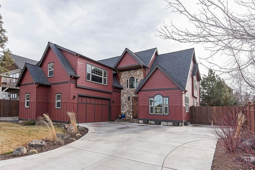 Beautiful custom built home with 3392 sq. ft. Abundant use of wood, stone, slate and tiles. Large gourmet kitchen with custom cabinets, center island and Jenn-air appliances. Solid wood doors, beautiful hardwood floors, arched doorways, and stone fireplace. Dining room with wood ceiling, office/den and large family room with Cascade mountain views. Two master suites and two laundry areas. Custom lighting package throughout home. Low maintenance private paver patio with paved RV parking.