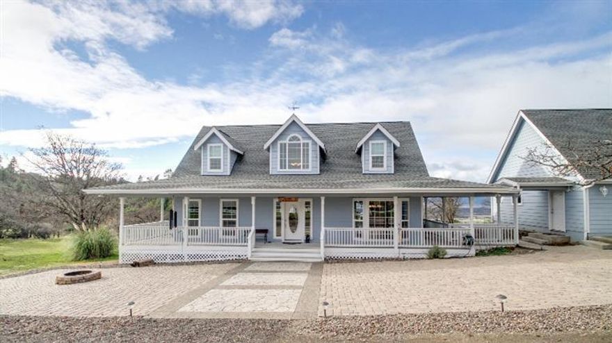 One owner custom built 2562 sq.ft. home w/stunning views on 6 ac! Spectacular views to Mt. McLaughlin right out front dr, master ste & formal dining rm. Views to Table Rock, Sams Valley & the beautiful Rogue River out back! The peaceful feeling of serenity surrounds you in this quiet setting while you listen to the river babble at night, yet you are so close to shopping, dining & entertainment all w/in 2 mi! The renowned Eagle Point Golf Course & Agate Ridge Vineyard are w/in 5 mi & Kriselle Cellars Winery w/in 8 mi! Hm is in great school district & close to bus stop. Exceptional curb appeal w/ pavers out front & 3/4 wrap around porch. Picturesque views out lg living rm windows w/gas fireplace! Kitchen has granite counters w/island & pull out shelves. Main level mstr ste has sun rm off bath w/windows to more views! Lg deep 875 sqft 3 car detached garage w/cupboards, closets & work bench! Ample, easy-access, indoor storage! Water softner for pure well water & Fire protection system!