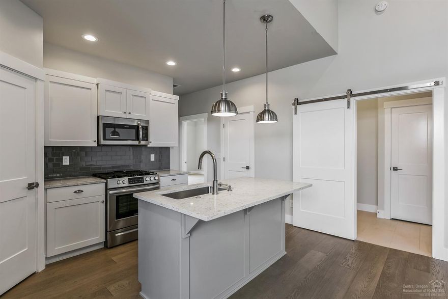 Luxury inspired finishes are throughout this unique home. The Columbia interior package brings light and bright finishes to this 3 bed 2 bath home. The 1300sq ft lives large with vaulted ceilings, open great room and full laundry room. Fully landscaped and fenced with sprinkler system and private patio. Comes with Central A/C, is energy efficient and Earth Advantage Certified. Come see the difference at Prairie Crossing! Move In Ready!