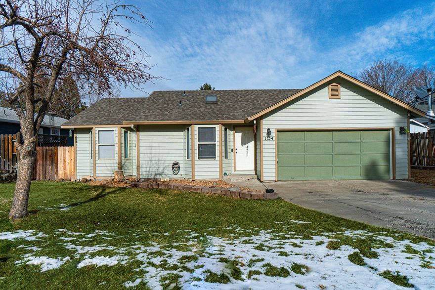 Nestled in a quiet community next to Hollinshead Park in the heart of Bend. This single level home has a Vaulted great room w/skylights that bring in an abundance of light. Comfortable layout w/new plank flooring throughout for a cohesive look. Kitchen offers upgraded Stainless Steel appliances, gas range, SS hood, painted cabinetry, laminate counter tops & slate backsplash. Dining area has a sliding door that opens to the back yard for convenient grilling & entertaining. Primary bedroom is lg enough for a King sized bed & has a bay window that's great for a reading nook. Two additional bedrooms look out to the back yard, all have nice sized closets for plenty of storage. Garage is insulated w/opener & an additional overhead storage rack for all your gear. Property is fenced & landscaped w/auto sprinklers. OPEN HOUSE Saturday 10-4 & Sunday 11-3 ONLY. Don't miss this one - Call TODAY!