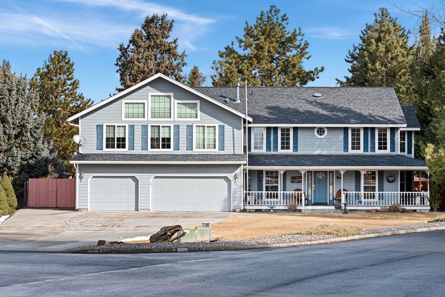 This traditional four bedroom home sits on nearly a half acre in SE Bend and affords easy access to shopping, restaurants and medical facilities. This home features a living room, office, family room w/certified woodstove, a  spacious kitchen with updated granite counters and an eating area in addition to a formal dining room. All bedrooms are upstairs and the primary bath has a tub, shower and dual vanities. A 1,200 sf bonus room with added in 2004 and features a gas stove with a river rock backdrop, a wet bar, a loft area and small deck with outside access. The huge 1,216 sf garage with workshop area can easily accommodate 4 cars with room to spare. Both the front and backyards are landscaped and have irrigation systems. The fenced backyard has RV parking with concrete pad, a storage building and wood storage shed. There are mountain views from the upstairs bonus room. Don't miss this wonderful home contact your Realtor to schedule an appointment.