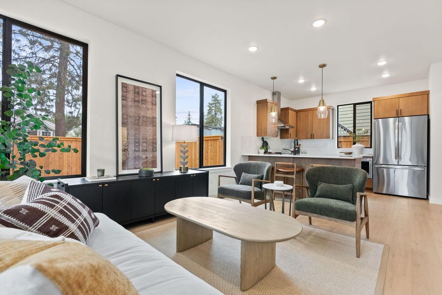 Downtown Bend investment opportunity meets modern mountain living. These newly completed townhomes are designed for your active lifestyle in this charming historic neighborhood. Across the street, enjoy freshly baked sourdough or locally roasted coffee at Jackson's Corner, with the Old Mill, Deschutes River, downtown, and Box Factory just around the corner. This desirable end unit offers two spacious primary suites with private baths, enhanced by a California Closet systems for elevated organization. Private storage shed provides secure space for bikes, skis, and gear, while the spacious, fully fenced, low-maintenance backyard is a rare find in this location. Energy-efficient construction, zoned heating/cooling, and lock-and-leave design ensure ease of ownership. Investors will value the highly rentable location, while second-home buyers will love the lifestyle. With no costly HOA dues and a $10,000 financing incentives, this home is all about quality and value. Make it yours today.