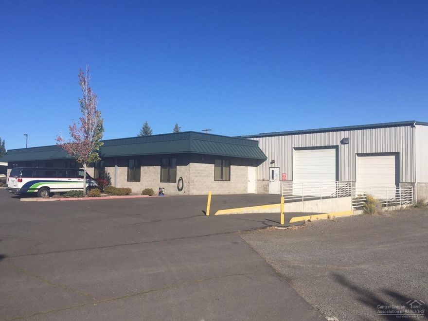 The building was constructed in 1997 as the home of Muzzys Performance Products. Zoned IL (Industrial Light), the site is on one (1) tax lot totaling 1.62 acres. The industrial facility totals 17,250 RSF. The estimated office SF is 2,800 +/- consisting of multiple offices, breakrooms, conference room and bull pen area. The estimated warehouse SF is 14,450 +/-. There is one (1) eight foot (8') roll up door on the eastern portion of the facility and one (1) dock high access door on the western portion.