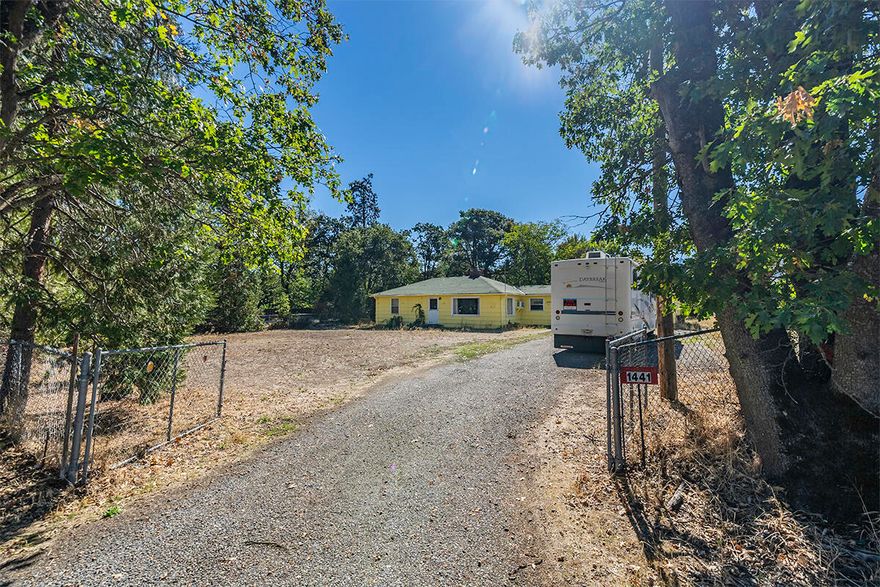 Looking for a large lot for your toys. This property has it. The single story 3 bedroom 1 bath home sits on a .48 acre lot with an adjoining .02 acre parcel in front. The home has great bones. Bring your imagination and sweat equity ideas.