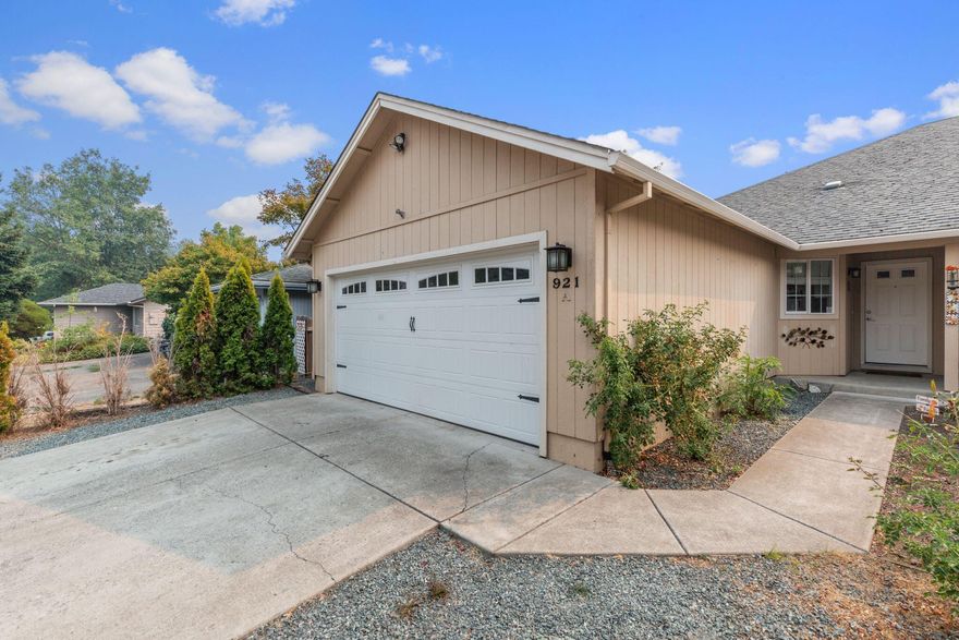 Comfortable and spacious zero lot line home (meaning one wall is shared with the neighbor unit like a townhouse or condo but there is no HOA fees) perfect for a family. Well kept 3 bedroom 2 bath house in quiet neighborhood and close to shopping, school bus and I-5 access. Newly remodeled kitchen with appliances included. Large attached 2 car garage with utility sink and laundry nook with additional parking on the side. Spacious low maintenance fenced yard with storage shed and covered patio. Great for entertaining, pets and gardening. Family, dog and walk friendly neighborhood. New water heater, HVAC system, and garage door. House is currently occupied by tenants who are in the process of moving so excuse any mess. 5 minute drive to Talent and Medford. 10 minute drive to Ashland.