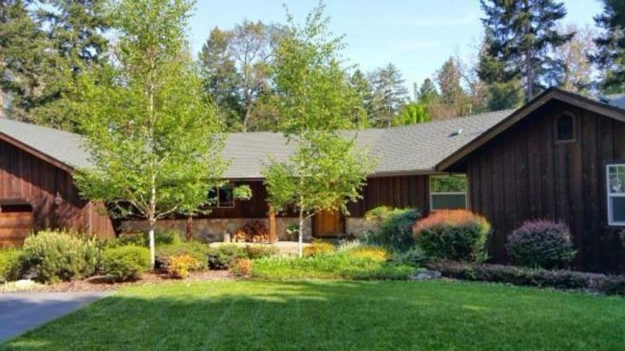 Be sure to obtain amenities sheet before viewing. Honestly, this gorgeous property is the definition of the Oregon Dream''! From the moment you open the security gate when coming home to just sitting on the deck, you won't believe the beauty that is yours. The level 2.73 acres rivals any park you may have been to and boasts a seasonal creek, two walking bridges, majestic trees, and a walking trail around the property with all of it being deer fenced. Enjoy the night sky from your private Artic Spa sitting just off the master. On those cooler evenings, snuggle up & enjoy the wood burning fireplace in the great room or the gas fireplace in the master. And for the gourmet cook, there is a Thermador range/oven, a Jenn-Air refrigerator, a large pantry, granite counters and even more. The 2168 sq ft cedar home has an open floor plan, vaulted ceilings, ceiling fans, 3/2, and a very large cedar deck which is perfect for entertaining or just enjoying the day with family and friends.