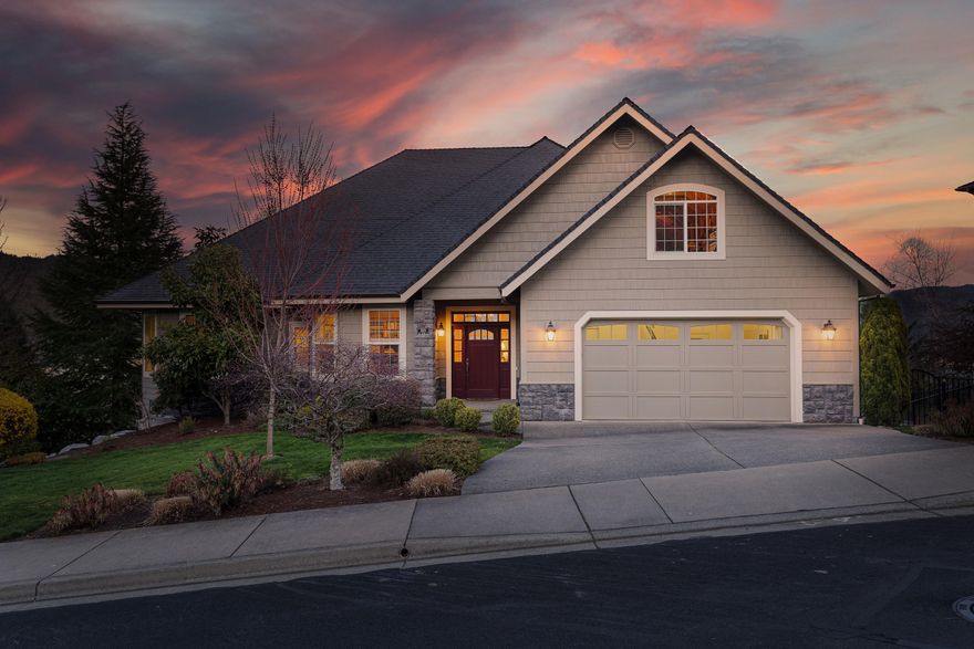 This bright & airy custom home w/breathtaking mountain views is one of the finest in the area. A welcoming entry leads to an office w/built-in cherry cabinets/bookshelves, dining room w/custom wine rack & grand great room w/14' ceilings, natural gas fireplace & 5' windows overlooking sweeping views. Next, the perfect kitchen w/SubZero fridge, Wolf cooktop, massive island, custom pull-outs, under-cabinet lighting, spacious pantry & oversized stainless-steel sink. A 600sf covered deck conveniently adjoins the kitchen. A luxurious main floor master suite boasts large walk-in closet, 10' trayed ceilings, many windows, mountain view & ensuite bath w/walk-in shower & massive soaking tub. A 2nd bedroom has ensuite bath w/tile floors & walk-in shower. Downstairs: 3 spacious bedrooms, full bath w/tub/shower & family room w/10' ceilings. Other amenities: large patio, fenced yard, irrigation system, main level laundry/mudroom, on-demand hot water, dual heating/air conditioning & security system.