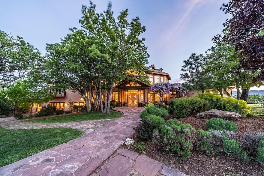 Bring your offers! Very rare property in Southern Oregon. Looking for privacy, serenity, healing & views? This home took 5 years to build has over $13 million into it with the best materials & craftsmanship. Could be a stunning estate home or possible retreat center. Approx. 11,000 sq ft offers grand entry, marble flooring. Lg windows to take in the amazing views of the valley, stained glass ceilings, master suite on the main level w/ lg jetted soaking tub, 11 bedrooms, 9.5 bathrooms & private balconies, Commercial kitchen, indoor Tropical conservatory, office's, meeting rooms, dining room, separate spa area with its own entrance, 4955 sq ft barn with office area, pond, stables and washroom. Geo-thermal, wind & solar power, underground utilities, back up generator. All of this and more on over 96 acres with plenty of water & sunshine.