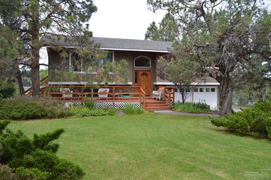 Wonderful home in a desirable NW Redmond location! Located on just over an acre, gorgeous mountain views, so much to offer! 3 bedrooms, 3 full baths, living room, family room & large deck for entertaining! Old growth landscaping, RV parking and room for a horse. Community pasture adjoins this property as well. Small barn for chickens or ? The list goes on and on! In addition there is a separate entrance to the family room & office with attached bathroom that can be easily converted to a mother in law suite!