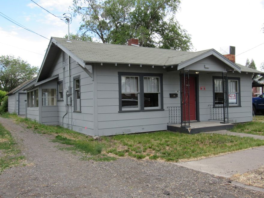 This nice and clean 2 bedroom 1 bath home is move in ready! This home was just painted on the exterior. Large living room and a laundry room. Nice laminate flooring. It has a detached garage and a fenced backyard.