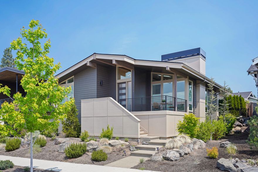 You will love this single-level Contemporary home built by Heritage Homes and located in the heart of NWX; minutes from great schools, shops, restaurants, and parks. The home offers vaulted ceilings, wide-plank wood flooring and luxury finishes throughout. The huge island kitchen has quartz counters, white cabinetry, & Jenn-Air appliances; Great room has sky lights and gas fireplace. Primary BR is separated from the others and features a stunning bathroom with tiled walk-in shower. Other features include a large laundry rm, 2-car garage plus xtra parking pad, and a fenced patio with alley access.