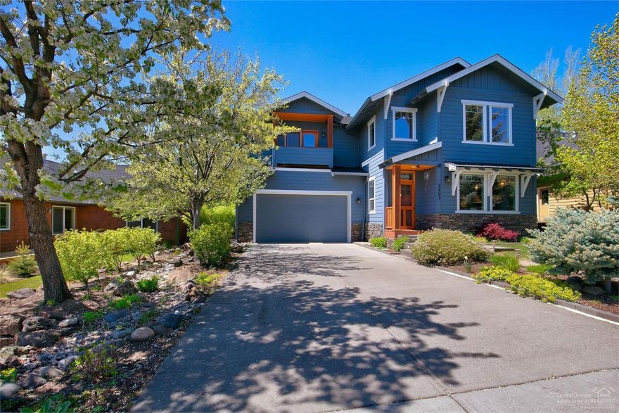 Beautifully updated contemporary home in Northwest Bend! Grand vaulted ceilings make this home light and bright with gorgeous gas fireplace w/Peruvian Walnut mantle, Claro Walnut bar and desk tops, stainless steel appliances, slab granite, hardwood floors and new carpet. Large master suite w/vaulted ceilings, walk in closet, master bath & private balcony. Enjoy the backyard oasis with large back patio, fire pit and stunning water feature including pond with fish. Don't miss out on this home!