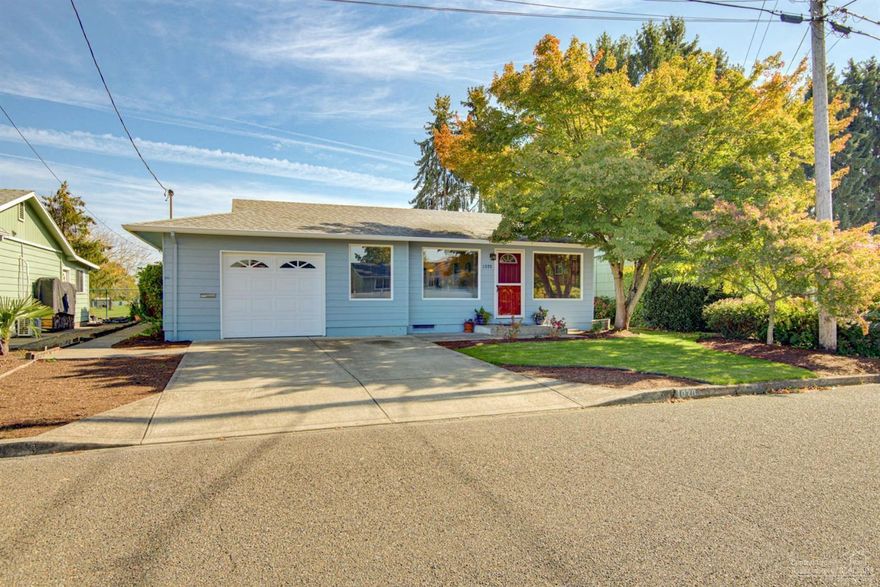 Beautifully updated larger home in Woodburn Estates & Golf. The kitchen has new cabinets & countertops, tilebacksplash and stainless steel appliances - including refrigerator. Hardwood floors throughout. Interior laundry room.Slider leads to a covered patio. Fresh exterior paint. Forced A/C and gas heat. 55+ community with indoor pool, hottub, fitness center, 18-hole golf course, restaurant and more!