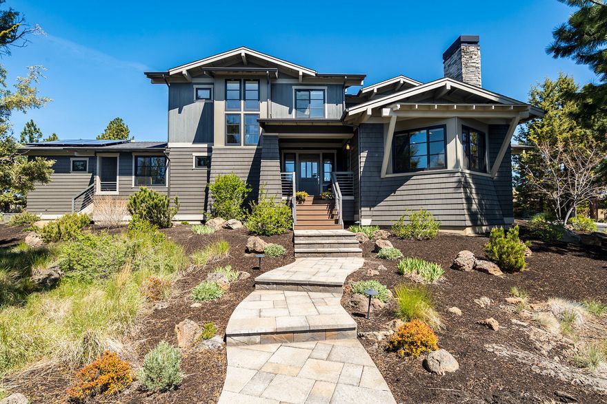 This house is beautiful AND energy efficient! Platinum Certified Earth Advantage & Energy Star Certified home with features that include a 4.7kw solar panel system, 2 tankless water heaters (one recirculating), Milgard windows, blown in foam insulation, Air Breath whole house fan, Napoleon wood burning fireplace insert and the furnace in conditioned space. The primary bedroom is located on the main level along with the office, laundry, mudroom, kitchen, dining and family room. The large kitchen island is perfect for entertaining and meal prep. Upstairs is a 2nd primary bedroom, 2 additional bedrooms, hall bath and bonus room. Outside features a large, private paver patio leading to a level, usable yard. Or, sit out front on the covered porch with eastern views. This house is the one!