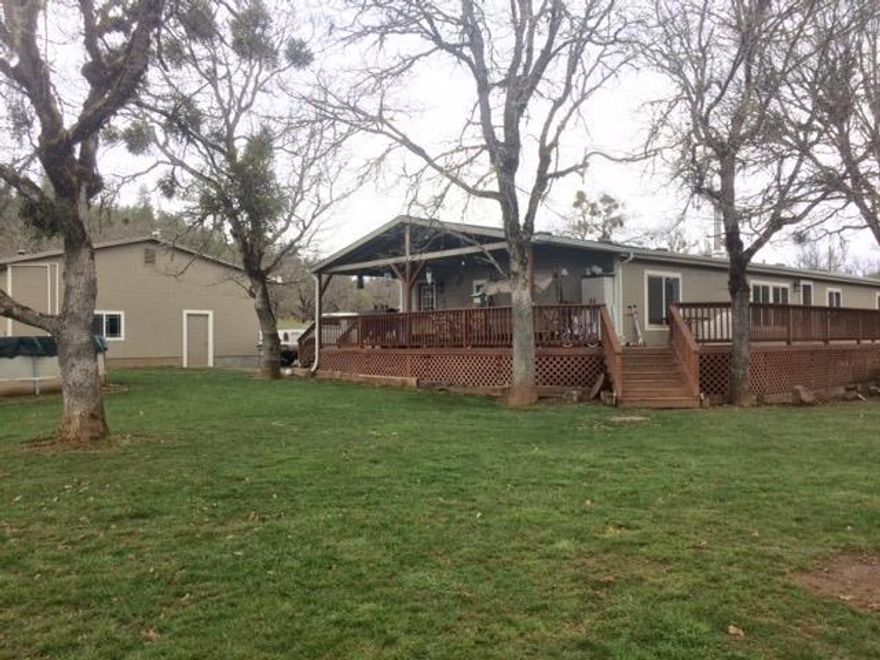 Great piece of rural property in the Sam's Valley area with 1.84 level acres, fenced and crossed fences for farm animals. The 2001 Manufactured home is spacious with 1848 Sq Ft featuring 4 bedroom, 2 baths with a split floor plan. The detached shop is 30 X 48 1440 SF shop with 110 and 220 power with two 10ft roll up doors. This property has 2 great producing wells.